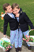 Dr. Huger's twin boys pose with Easter baskets